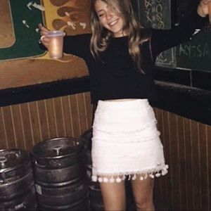 White lace mini skirt